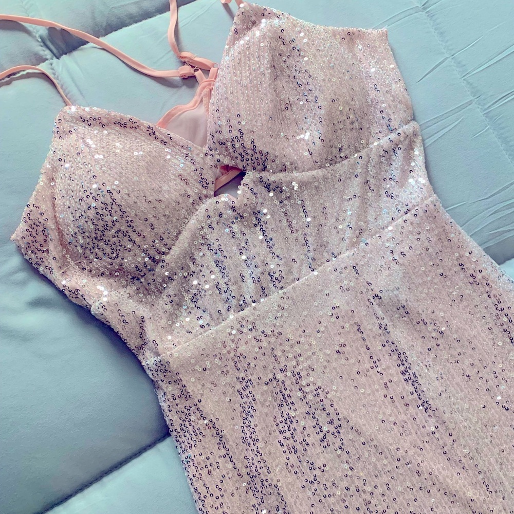 Light pink sequin-embellished prom dress with slit